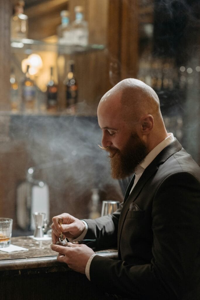 Bearded Man Smoking on a Tobacco Pipe